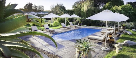 2 outdoor pools, pool umbrellas, sun loungers