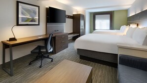 A hotel room with a bed, desk, chair, TV, and a framed picture on the wall. - Holiday Inn Express Hotel & Suites Tilton - Lakes Region by IHG (Tilton)