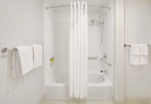 A modern bathroom with a walk-in shower, a bathtub, and a toilet. - Holiday Inn Express Hotel & Suites Tilton - Lakes Region by IHG (Tilton)