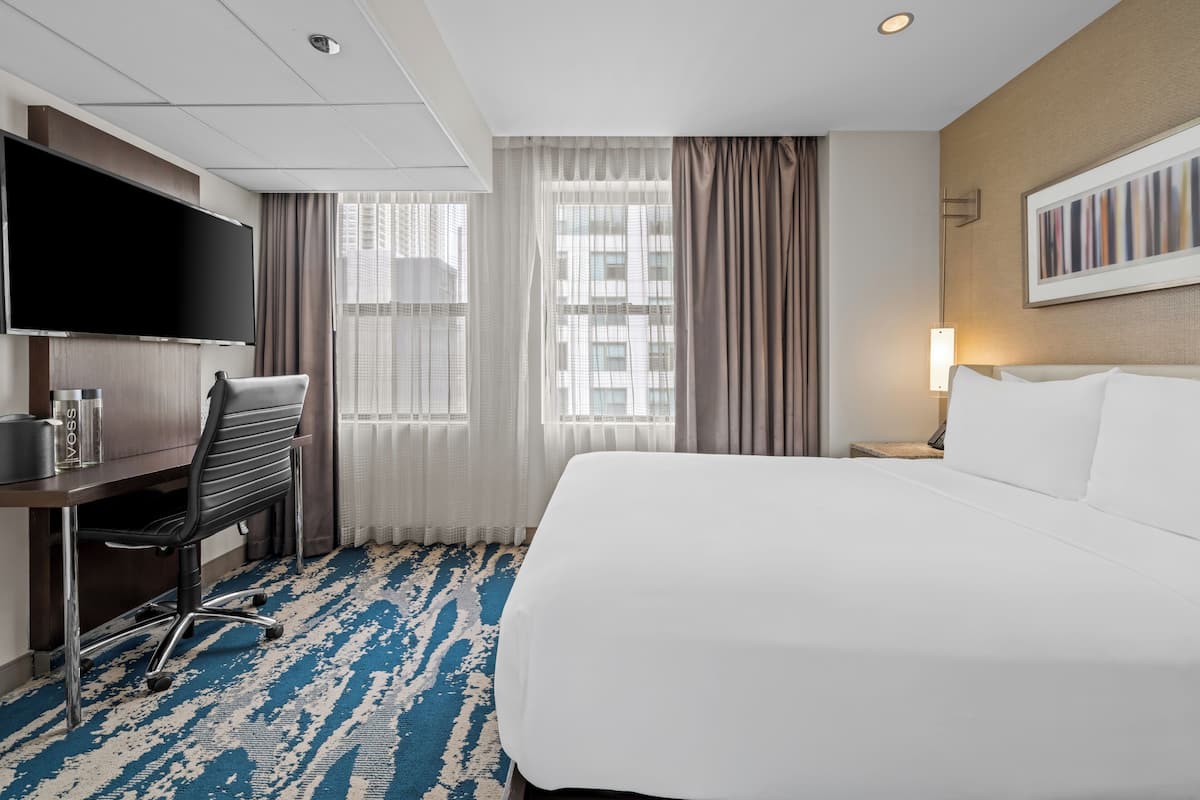 Egyptian cotton sheets, premium bedding, down duvets, in-room safe