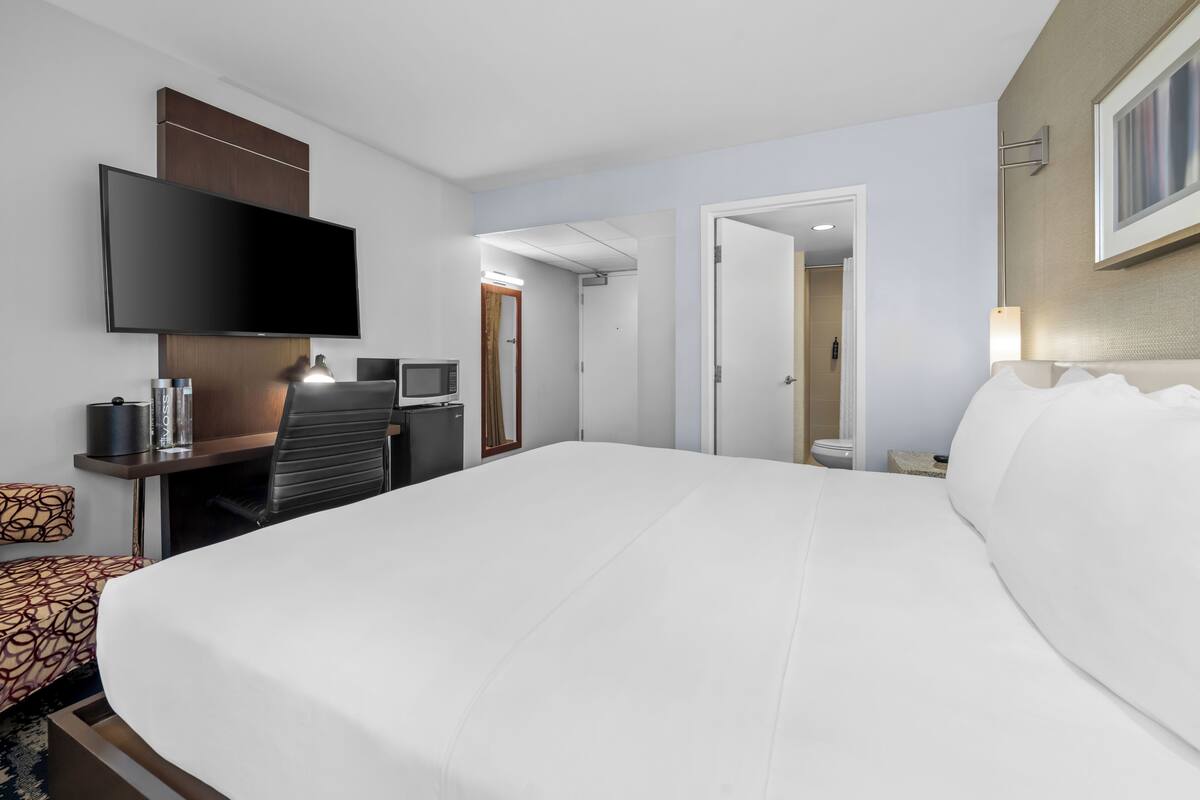 Egyptian cotton sheets, premium bedding, down comforters, in-room safe