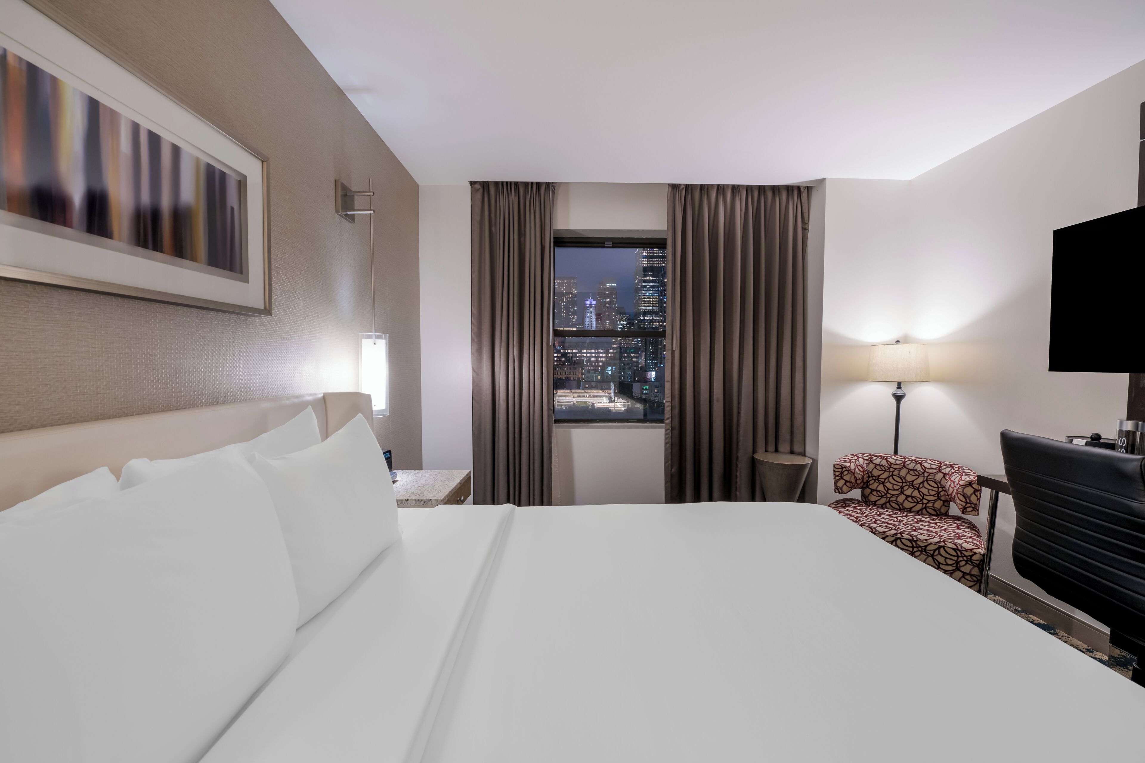 Egyptian cotton sheets, premium bedding, down duvets, in-room safe