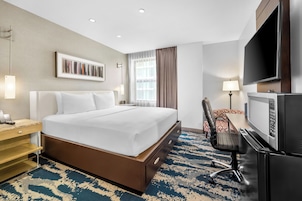 Egyptian cotton sheets, premium bedding, down duvets, in-room safe