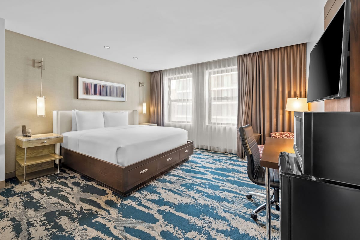 Egyptian cotton sheets, premium bedding, down comforters, in-room safe