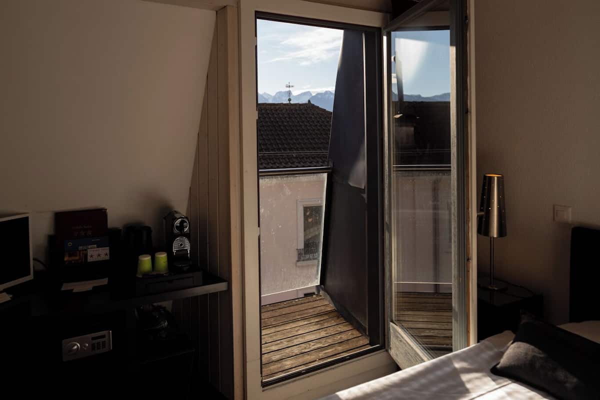 Standard Room with Balcony, City, Mountain & Lake view | 1 bedroom, premium bedding, in-room safe, individually decorated