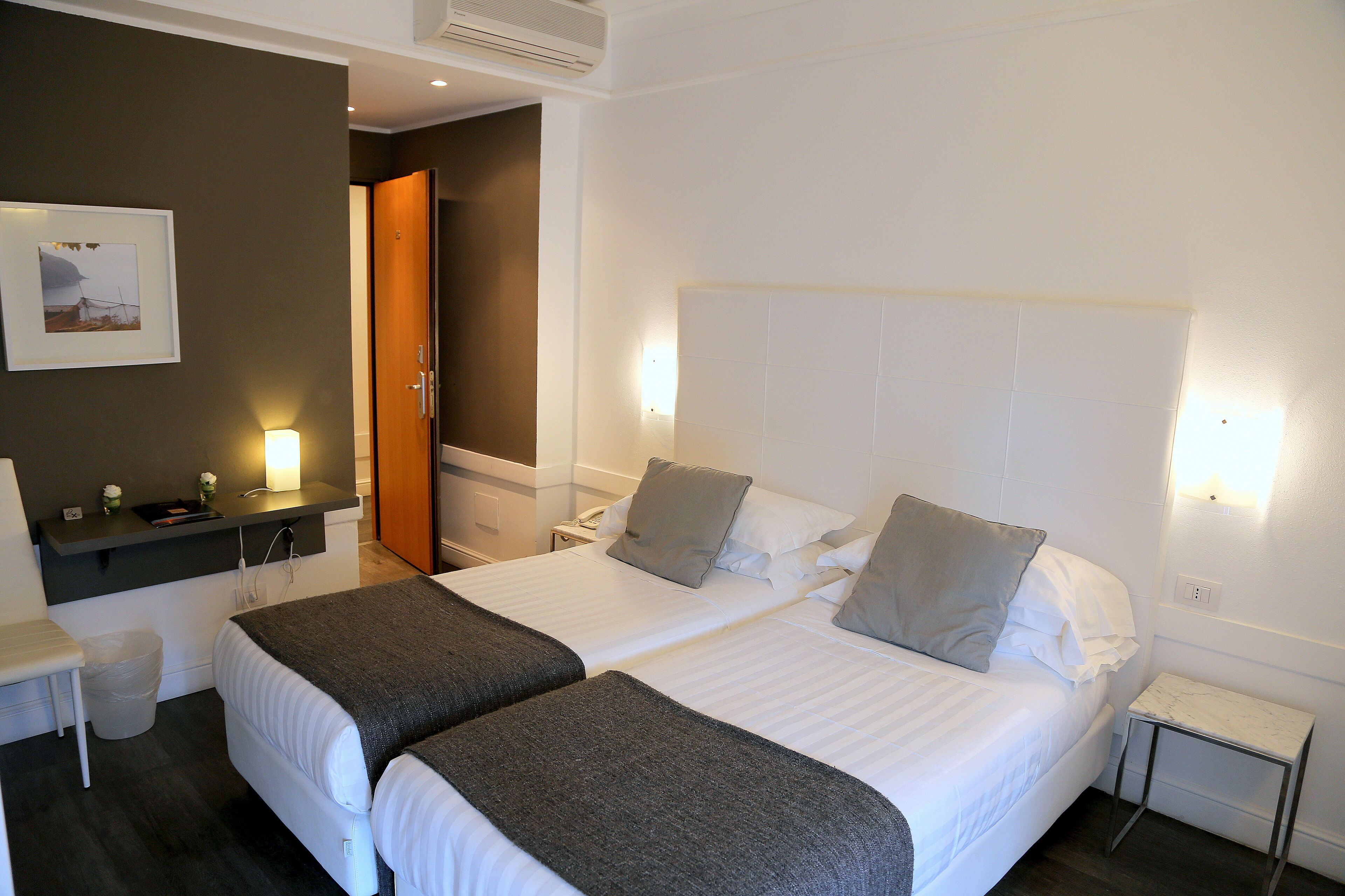 Basic Double Room, Balcony | Minibar, in-room safe, desk, free WiFi
