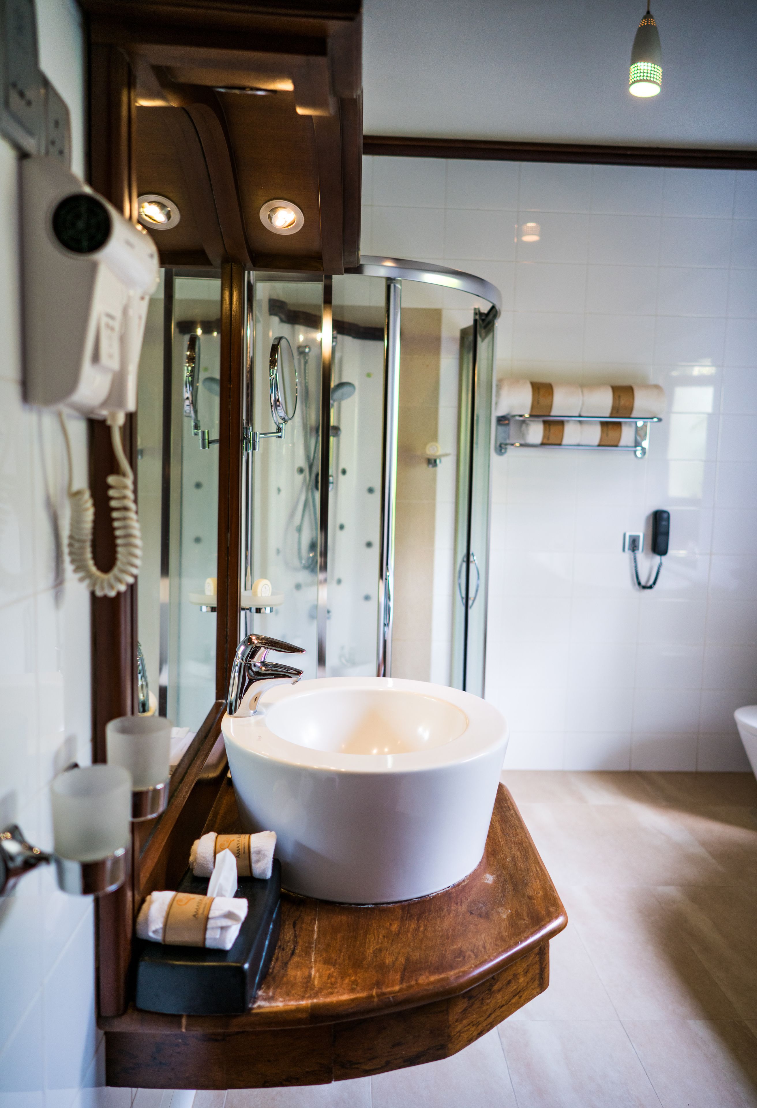 deep-soaking bathtub, rainfall showerhead, free toiletries, hair dryer