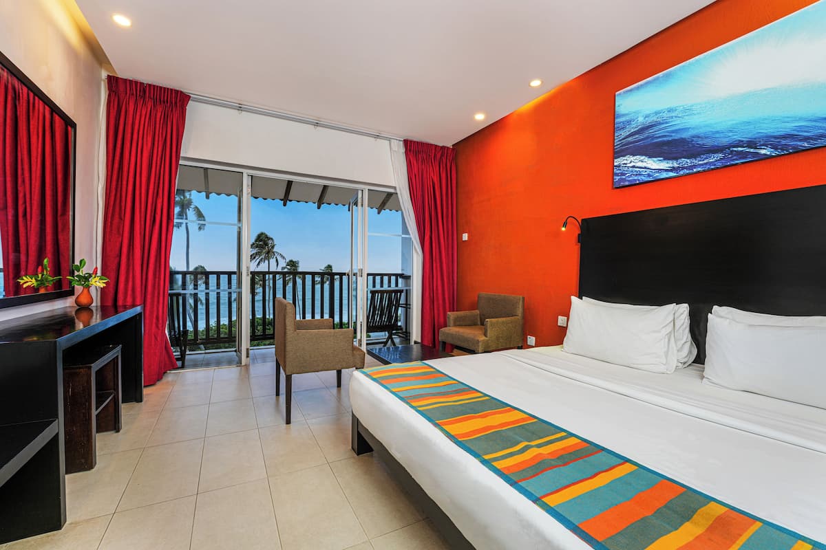 Deluxe Room, Sea View | Memory foam beds, in-room safe, desk, WiFi (free)