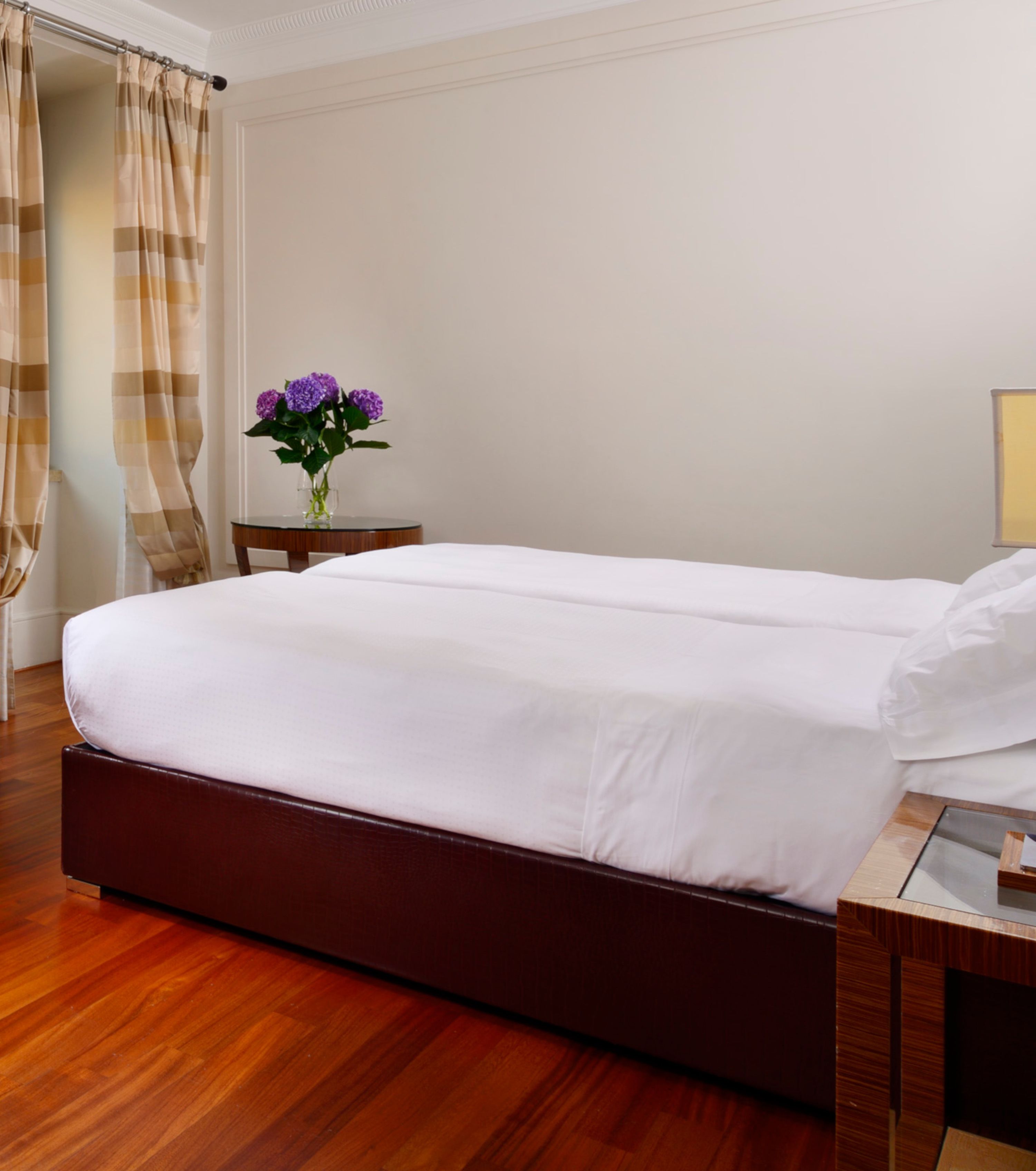 Hypo-allergenic bedding, down duvets, in-room safe