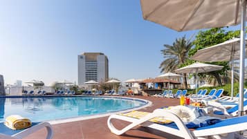 Outdoor pool, open 7 AM to 9 PM, pool umbrellas, sun loungers