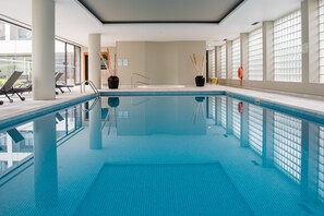 Indoor pool, outdoor pool, pool umbrellas, pool loungers