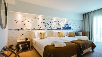 Draps en coton égyptien, couette en duvet d'oie, minibar