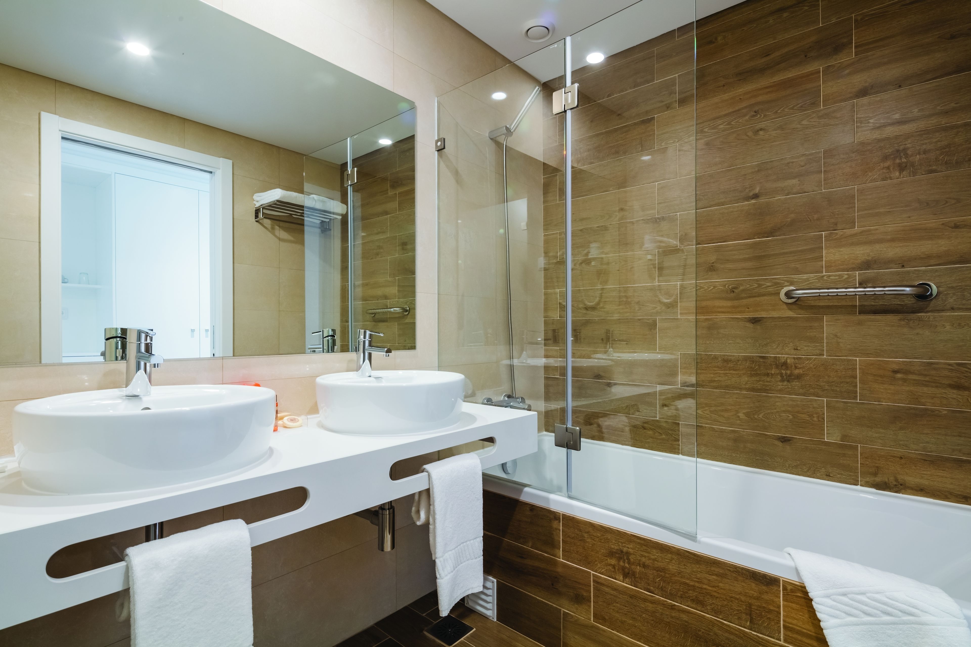 bathtub, free toiletries, hair dryer, bathrobes