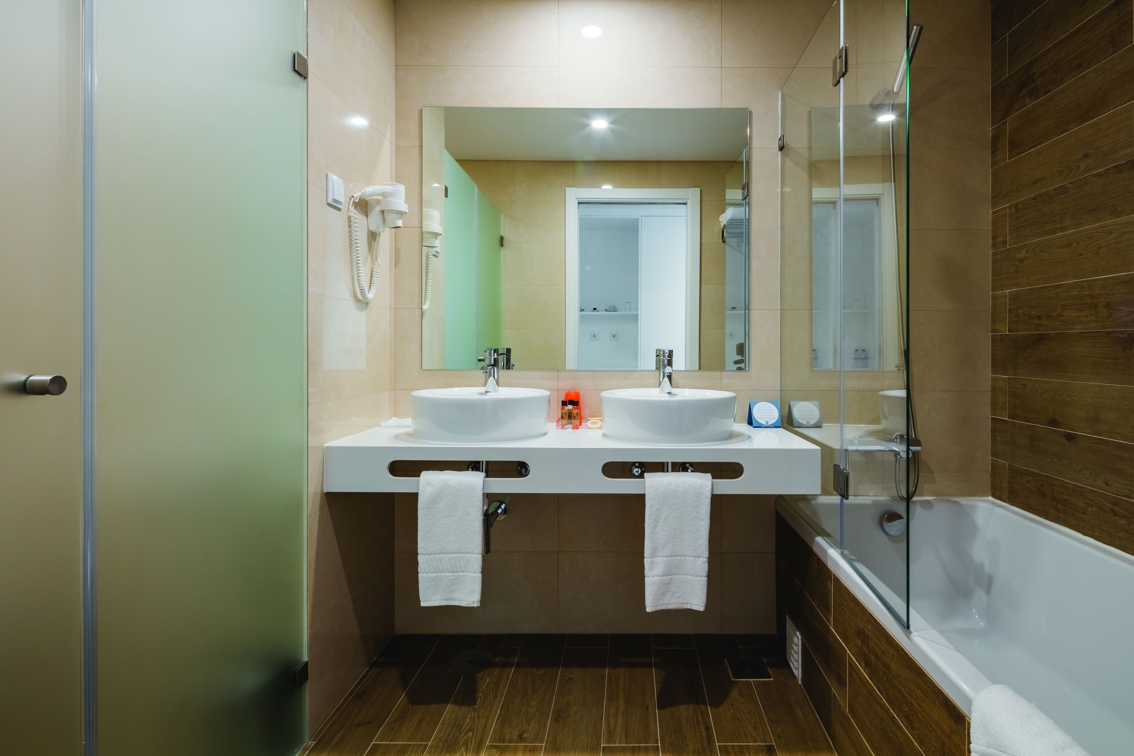 bathtub, free toiletries, hair dryer, bathrobes