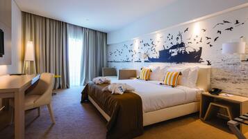 Draps en coton égyptien, couette en duvet d'oie, minibar