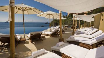 2 ulkouima-allasta, ilmaisia cabañoita, aurinkovarjoja