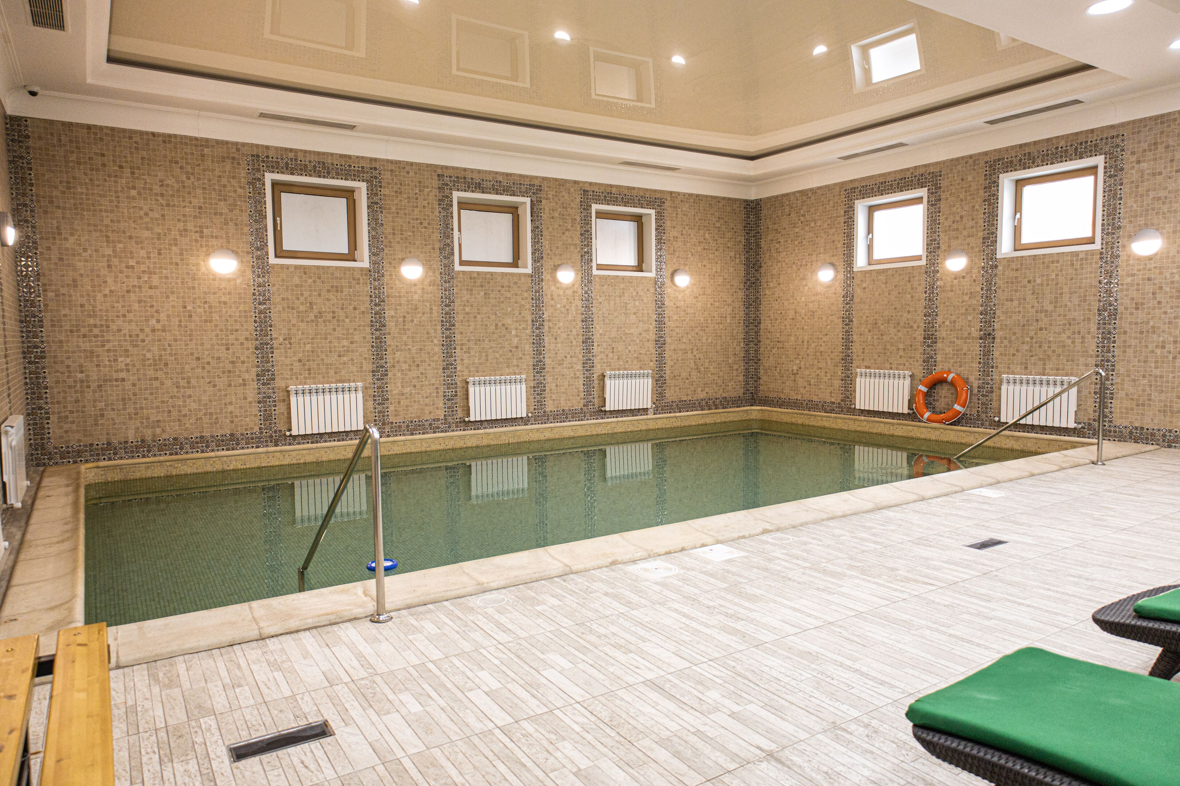 indoor pool, open 7:00 am to 10:00 pm, pool loungers