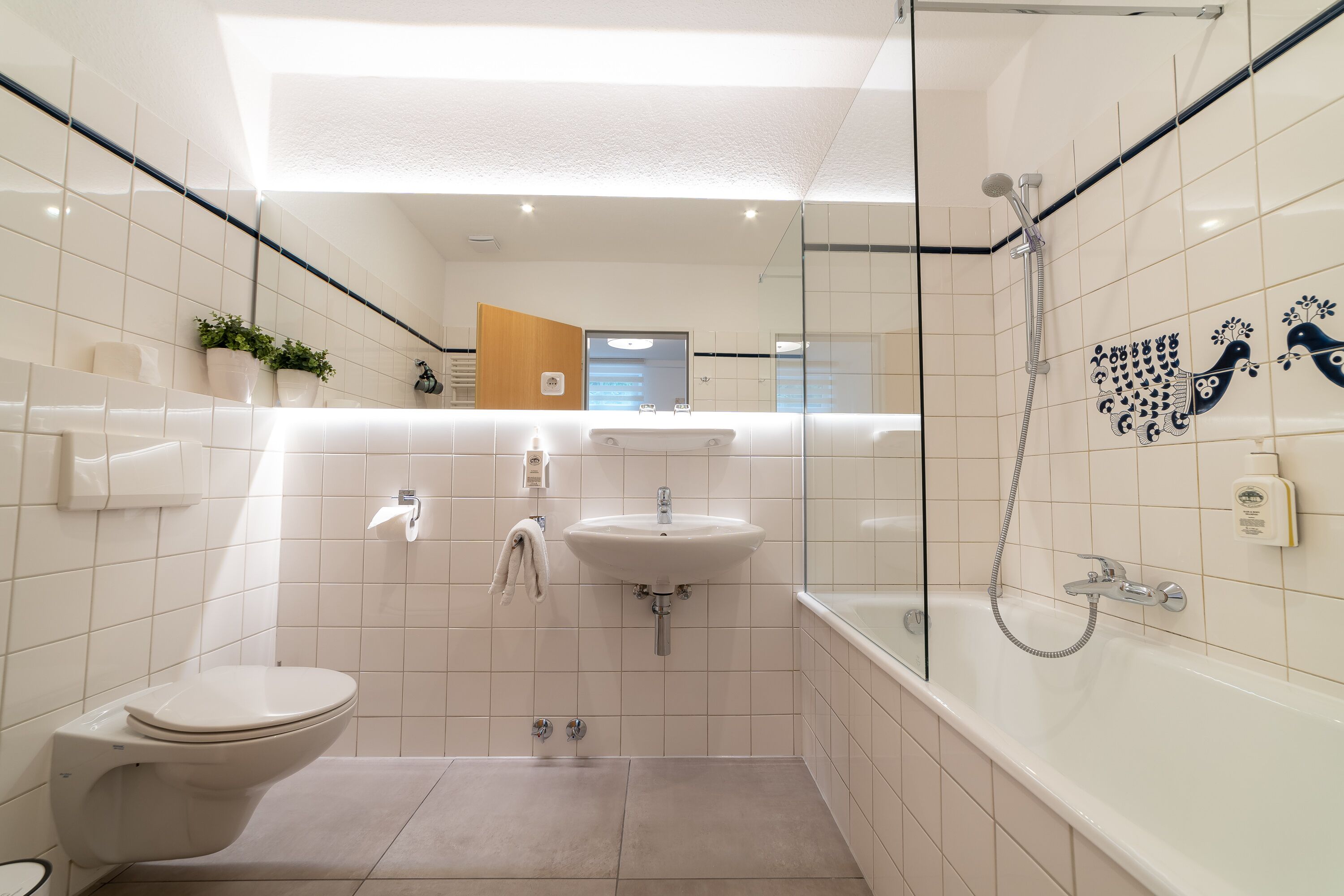 economy double room | bathroom | shower, free toiletries, hair dryer, towels