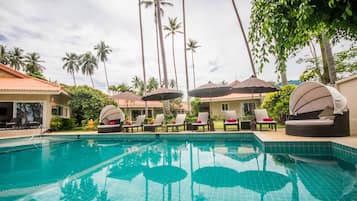 Outdoor pool, pool umbrellas, sun loungers