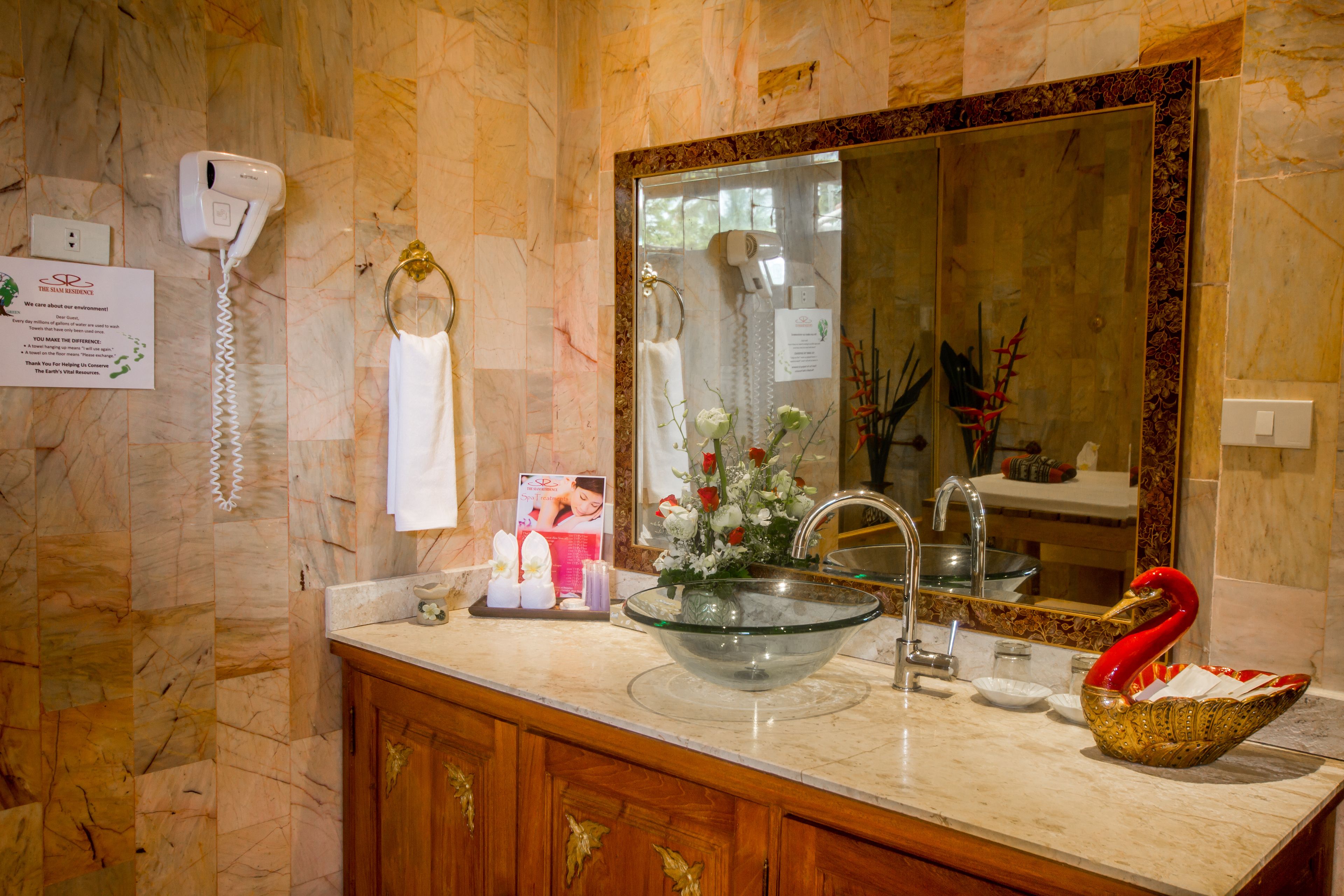 combined shower/bathtub, free toiletries, hair dryer, bathrobes