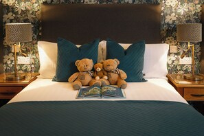 Family Room | Premium bedding, in-room safe, desk, iron/ironing board
