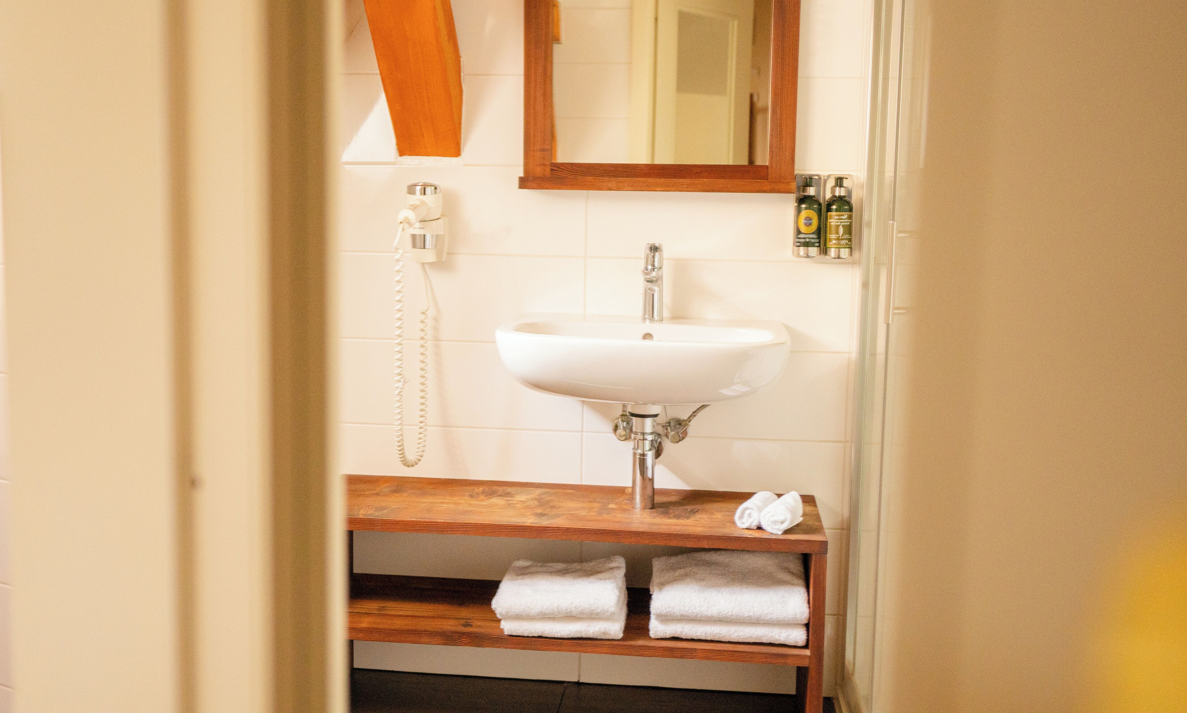 superior room | bathroom | combined shower/bathtub, designer toiletries, hair dryer, bathrobes