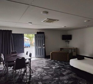 Family Townhome | Living area | 40-inch Smart TV with satellite channels