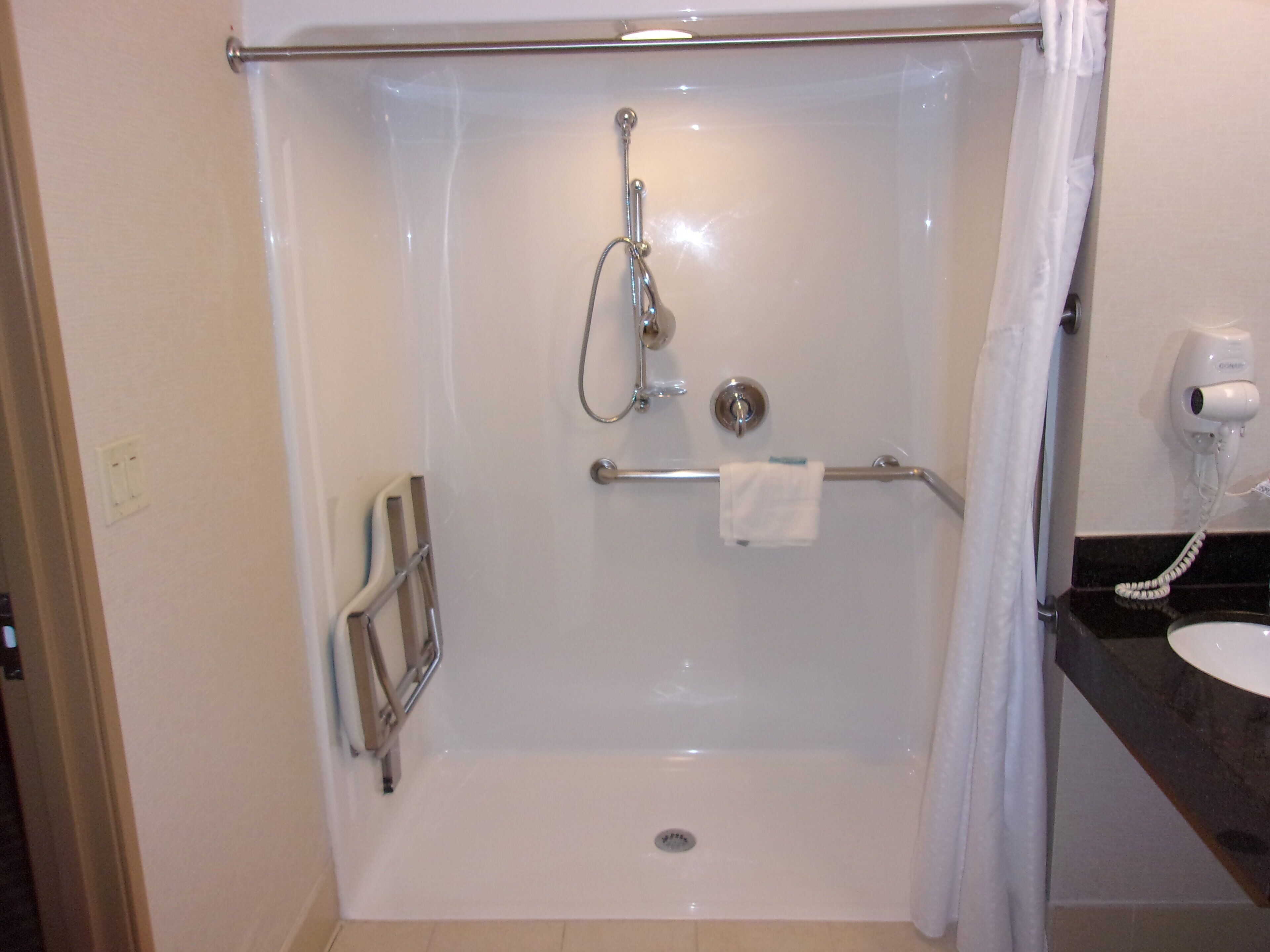 standard room, 2 queen beds, roll-in shower (communications) | in-room safe, desk, iron/ironing board, free cots/infant beds