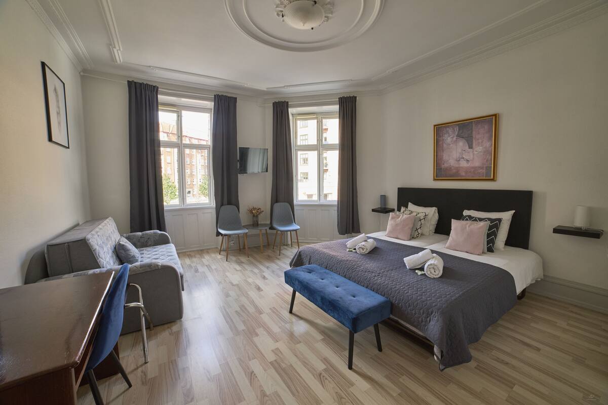 Suite junior | 1 habitación, tabla de planchar con plancha, wifi gratis y ropa de cama