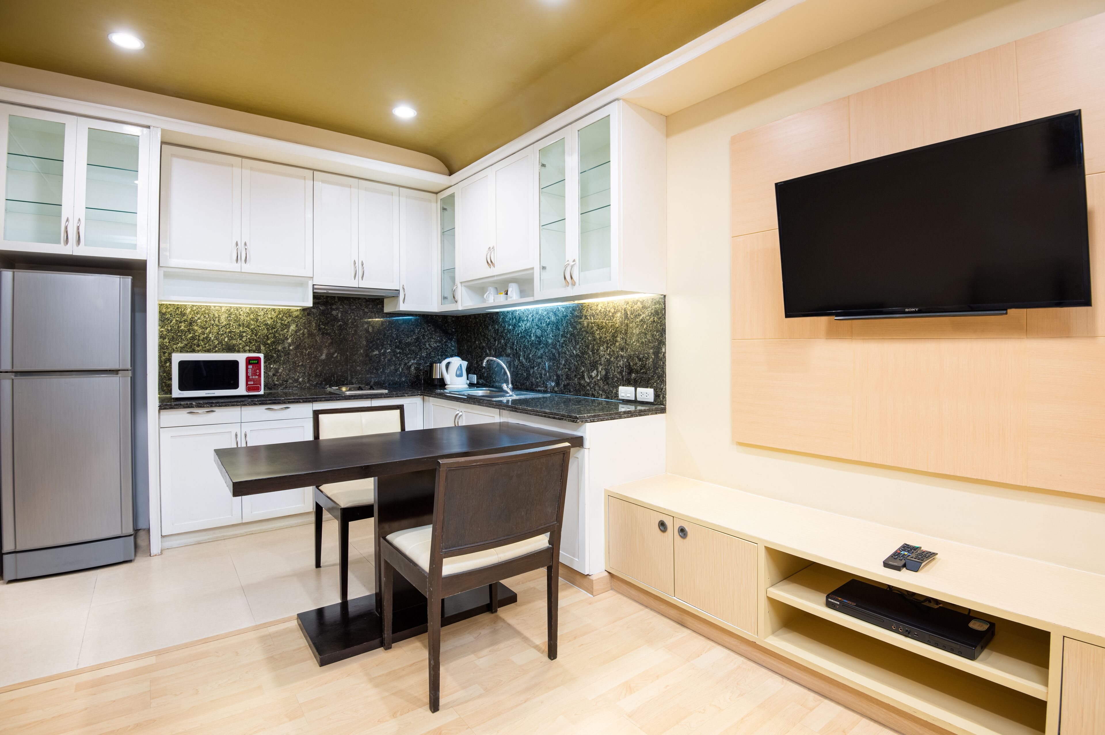 grand one bedroom suites | private kitchen | fridge, microwave, coffee/tea maker, electric kettle