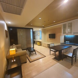 Grand One Bedroom Suites | Living area | 32-inch LCD TV with satellite channels, TV, DVD player - Admiral Premier Bangkok (Bangkok)