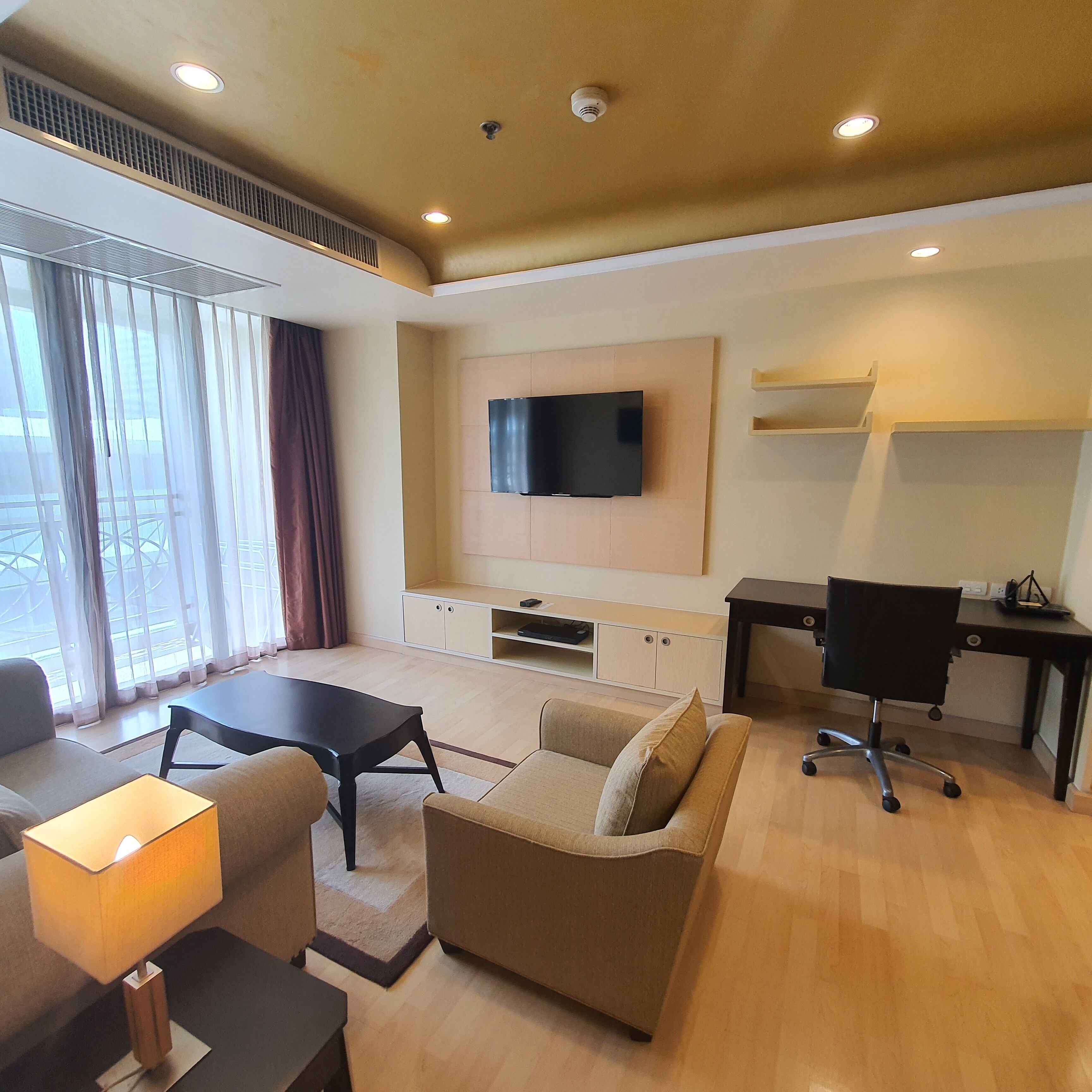 admiral one bedroom suite | living area | 32-inch lcd tv with satellite channels, tv, dvd player