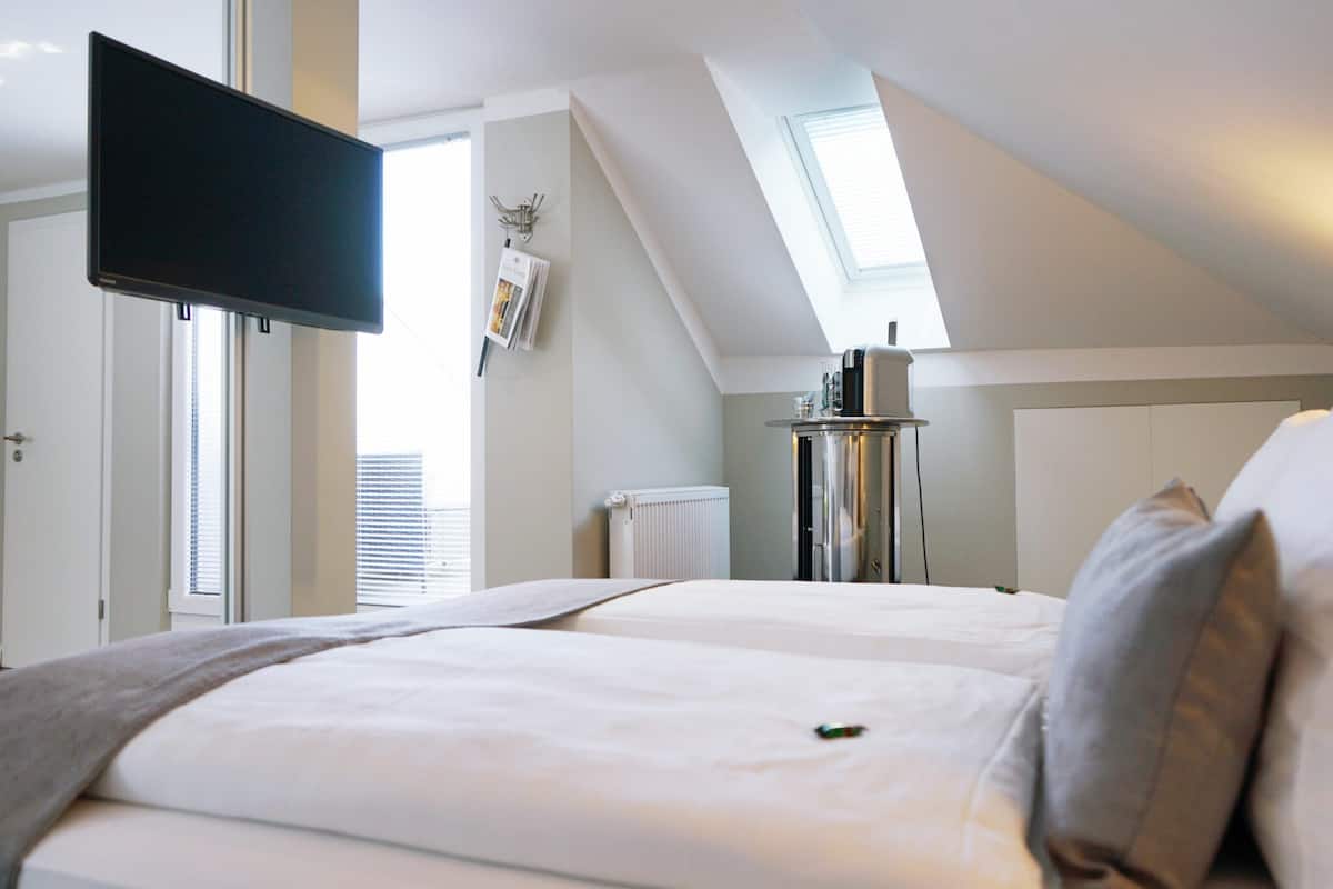 Junior Suite | 1 bedroom, premium bedding, in-room safe, individually decorated