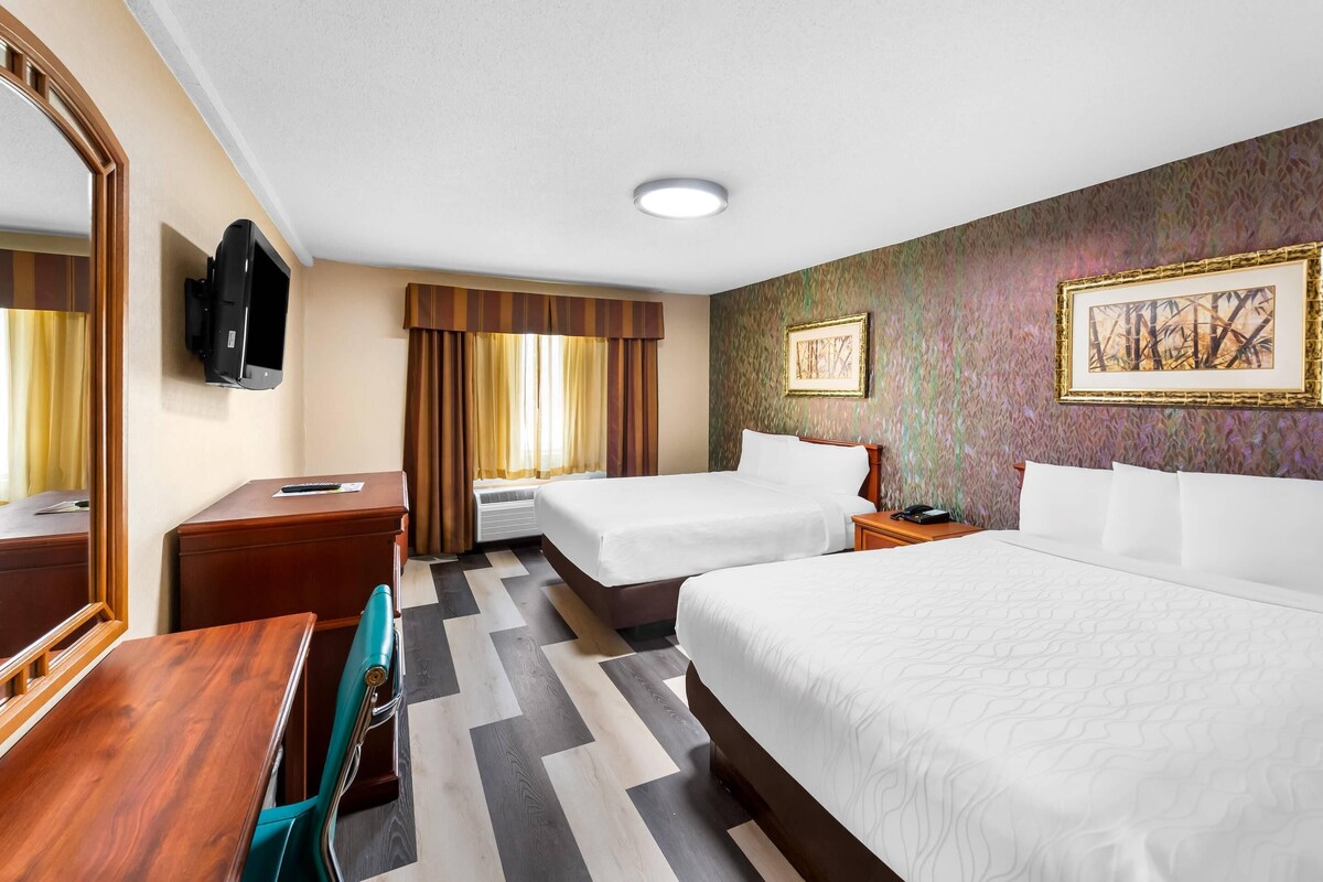 Standard Room, 2 Queen Beds, Non Smoking | Desk, iron/ironing board, WiFi (free), bed sheets