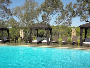 Outdoor pool, free pool cabanas, pool umbrellas