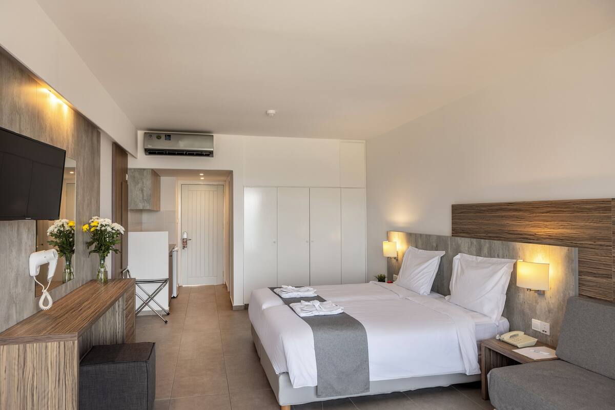 Superior Room Inland View | Pillow-top beds, minibar, desk, blackout curtains