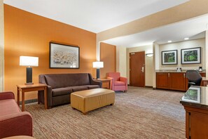 Desk, blackout drapes, iron/ironing board, free cribs/infant beds