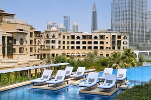 Outdoor pool, pool umbrellas, sun loungers