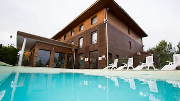 Outdoor pool, open 8:00 AM to 9:00 PM, sun loungers