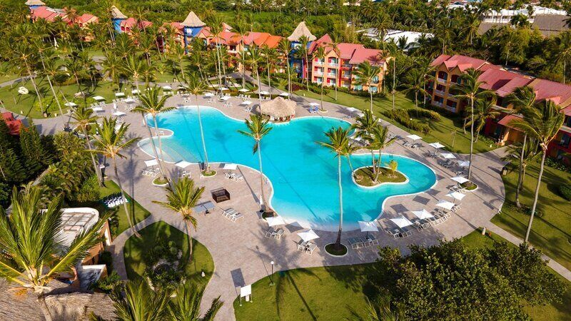 Outdoor pool, open 6 AM to 6 PM, pool umbrellas