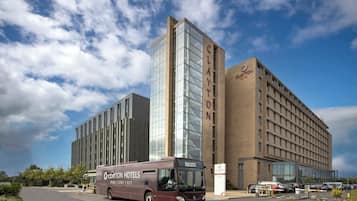 A Clayton Hotels building with a modern design, featuring large windows and a prominent sign.
