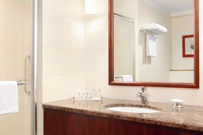 Shower, designer toiletries, hair dryer, bathrobes