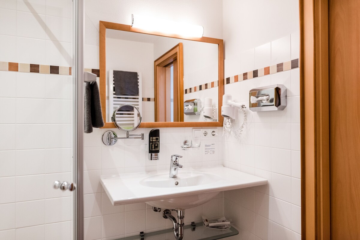 Bathroom | Shower, free toiletries, hair dryer, bathrobes