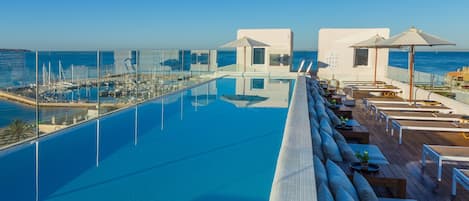 2 outdoor pools, pool umbrellas, sun loungers