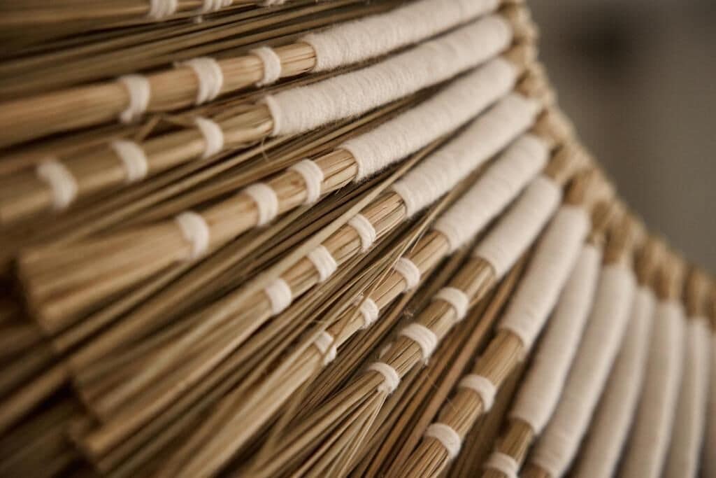 A close-up of a woven structure, likely a part of a room's decor or furniture.