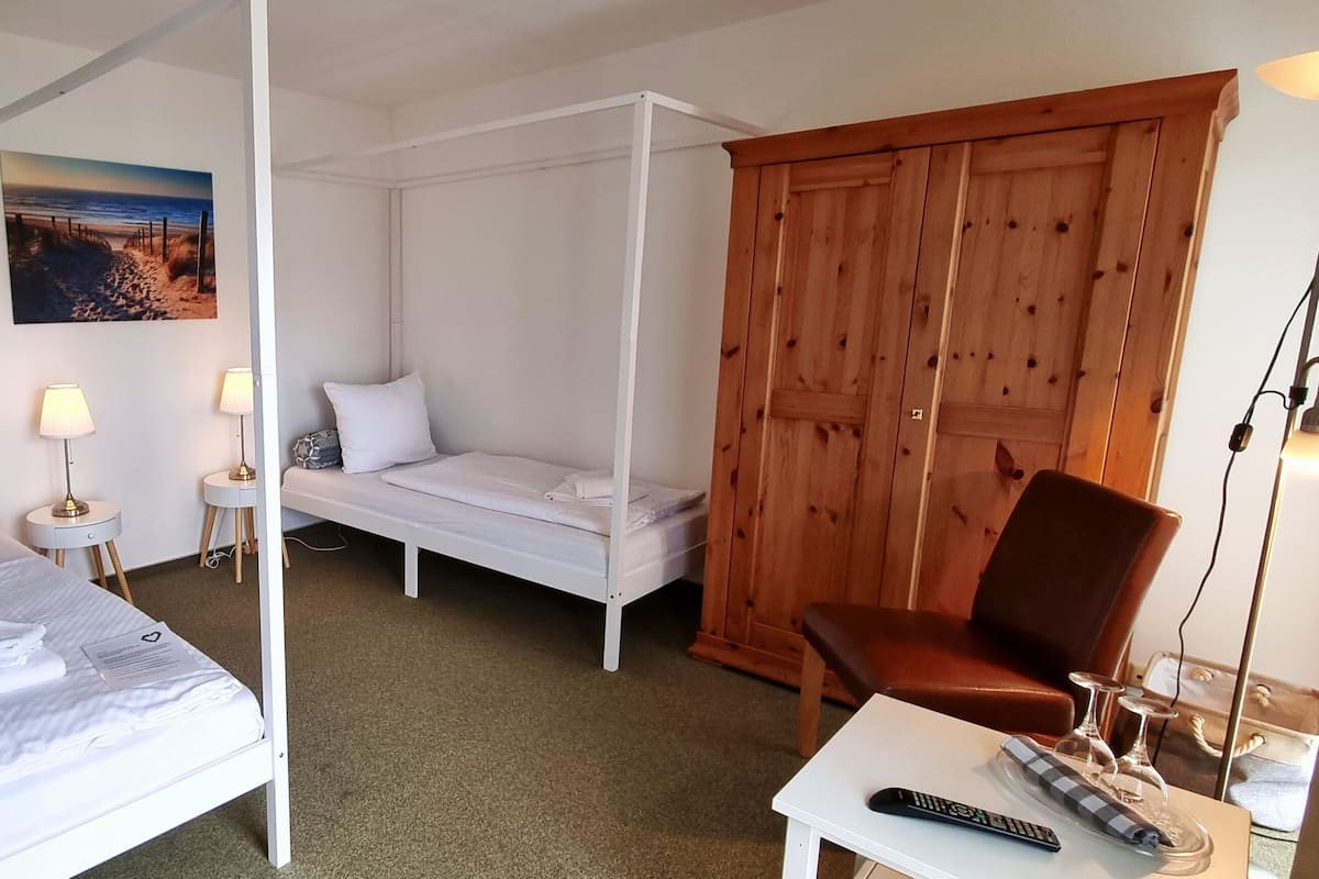 Family Room, 2 Bedrooms | Blackout drapes, soundproofing, WiFi (free), bed sheets