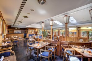 Breakfast, lunch, dinner served; local cuisine, garden views