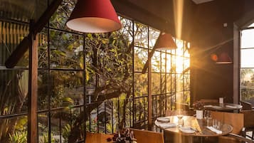 Breakfast, lunch, dinner served; garden views