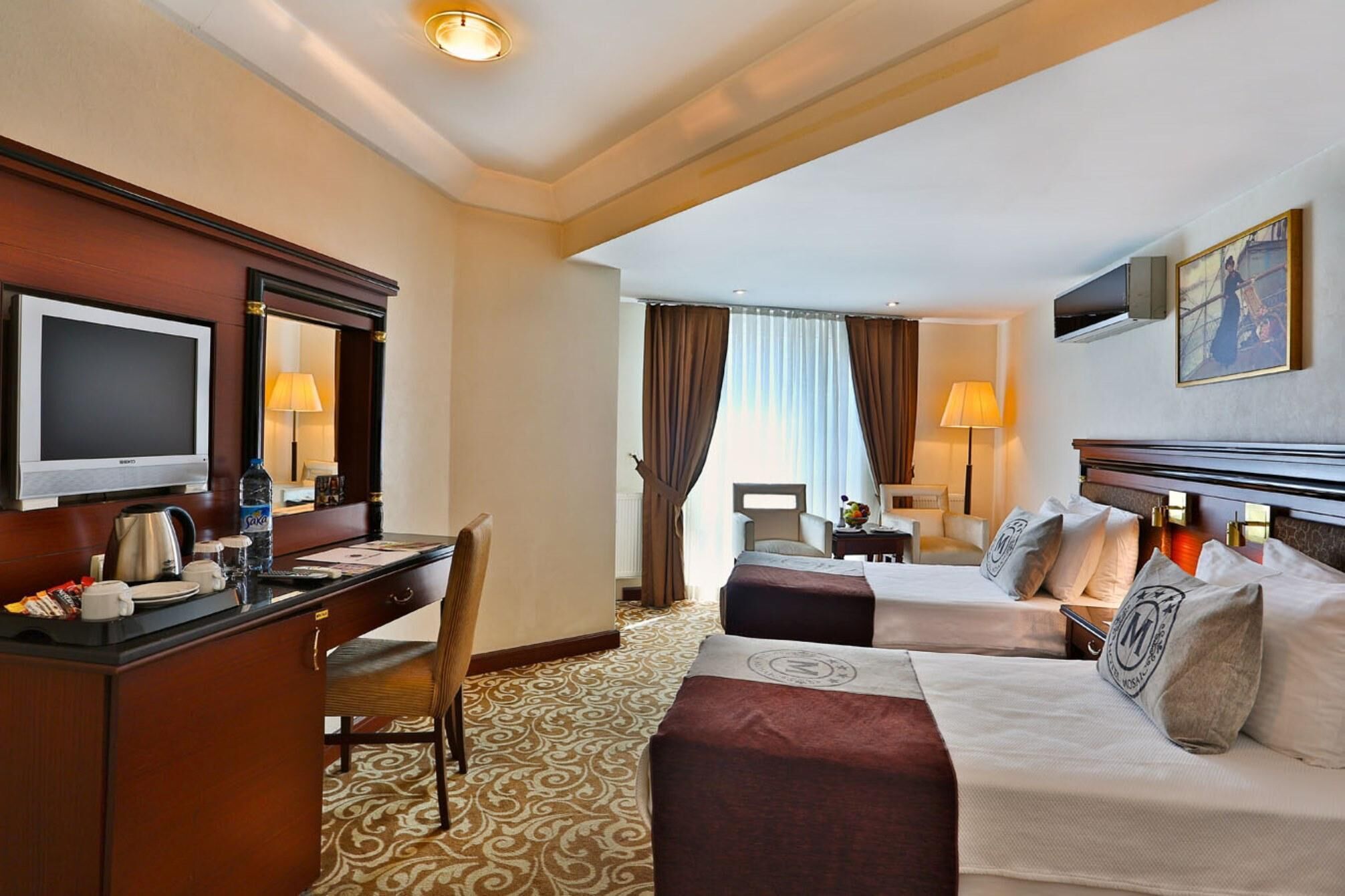Minibar, in-room safe, individually decorated, desk