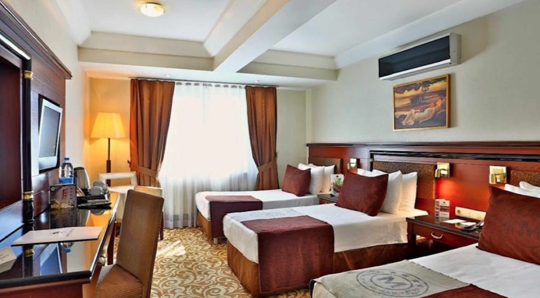 Minibar, in-room safe, individually decorated, desk